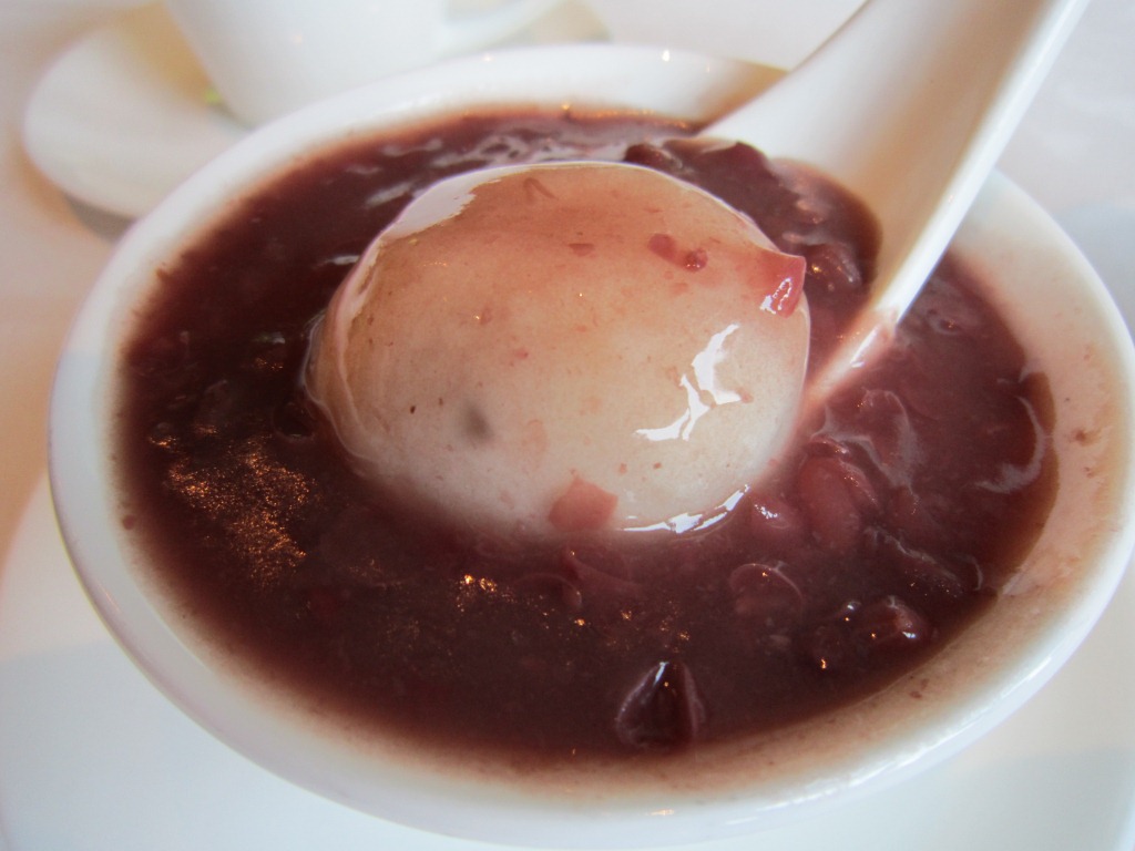 Dessert, sesame dumpling in red bean soup.
