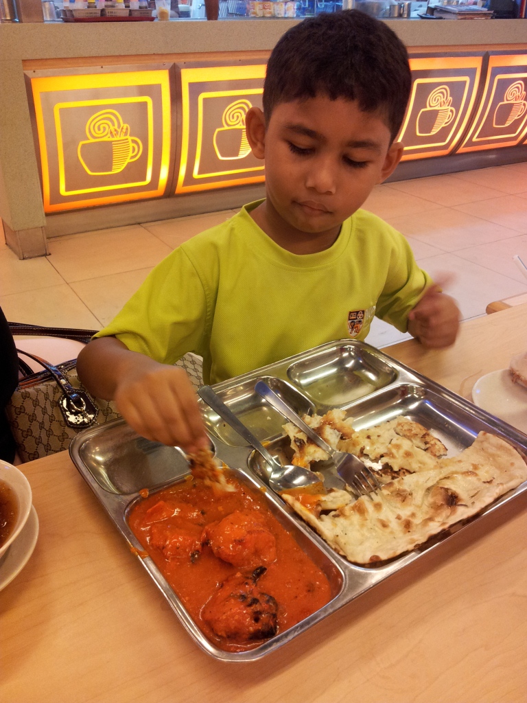 Nephew Eating Indian style... =)